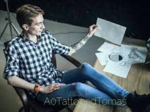 A0TattooedTomas